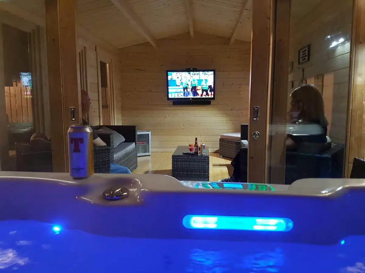 Eva E Garden TV Room with Hot Tub