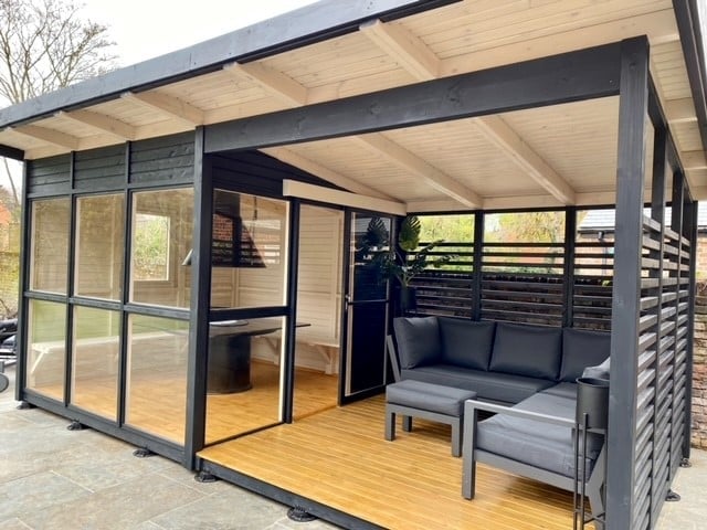 Customer photos of a newly built Elias BBQ cabin with veranda