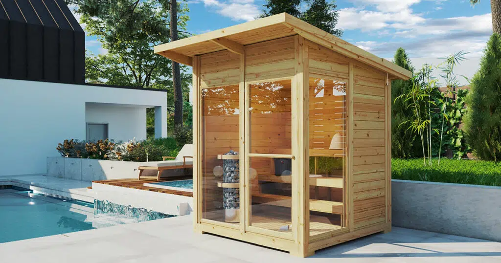 Small garden sauna cabin next to pool