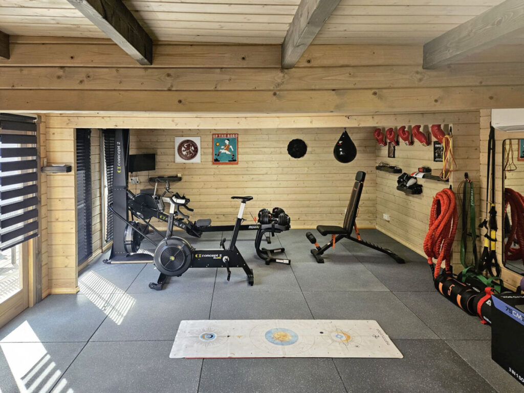 garden room gym with training equipment