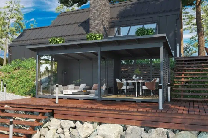 Modern grey garden house with glass wall and veranda