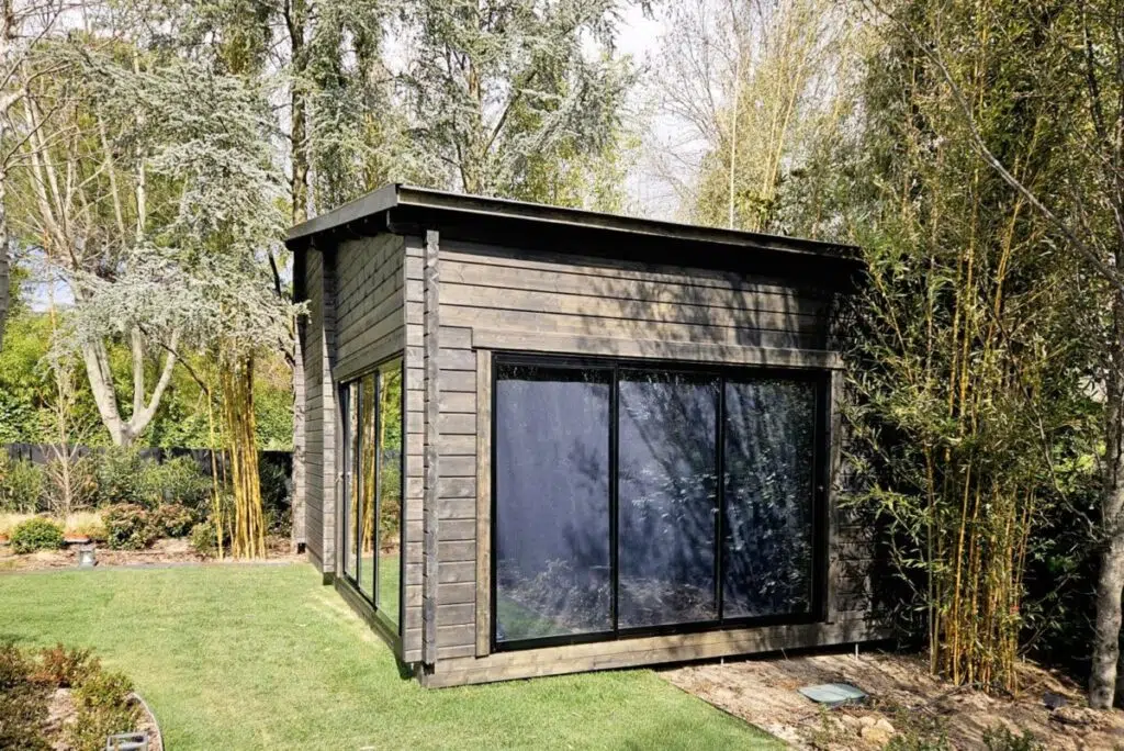 home golf simulator cabin exterior view in garden
