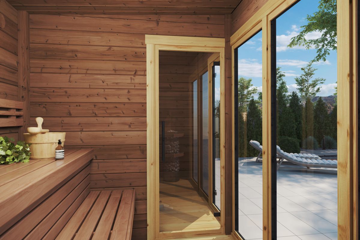 Modern outdoor sauna with flat roof and changing room. Made from thermowood. Inside view